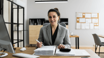 a professional tax accountant sitting at desk